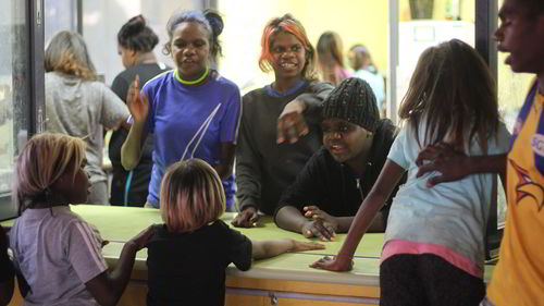 Papunya school chirldren  listening to their teachers